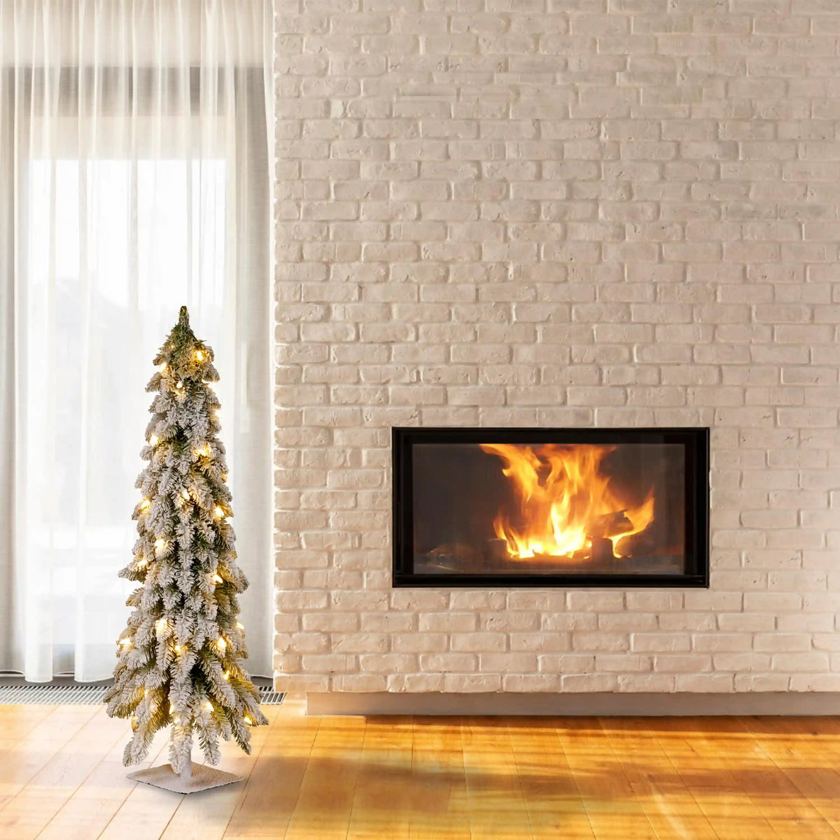 4 ft. Pre-Lit Snowy Downswept Forest Tree with Clear Lights, Plug-In